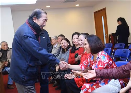 Các đại biểu tại buổi gặp mặt. Ảnh: Danh Lam - TTXVN