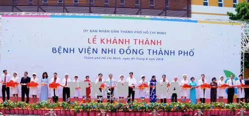 Lễ cắt băng khánh thành Bệnh viện Nhi đồng Thành phố Hồ Chí Minh. Ảnh: Đinh Hằng – TTXVN