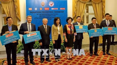 Tại buổi lễ đại diện các doanh nghiệp Thái Lan thông qua vận động từ Tổng Lãnh sự quán Thái Lan tham gia đóng góp kinh phí hỗ trợ các hoạt động từ thiện xã hội của SAPP. Ảnh : Thế Anh-TTXVN