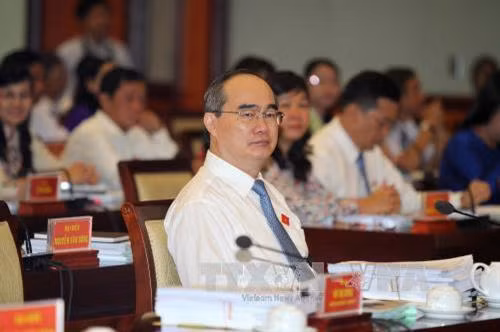 Ủy viên Bộ Chí trị, Bí thư Thành ủy Thành phố Hồ Chí Minh Nguyễn Thiện Nhân và các đại biểu dự kỳ họp. Ảnh: Thanh Vũ-TTXVN
