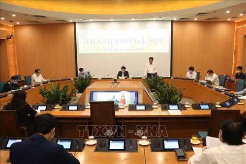 Chủ tịch UBND thành phố Hà Nội Nguyễn Đức Chung phát biểu tại điểm cầu thành phố Hà Nội. Ảnh: Văn Điệp - TTXVN