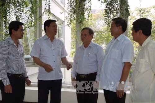 Bí thư Thành ủy Thành phố Hồ Chí Minh Đinh La Thăng với các đại biểu tham dự hội nghị. Ảnh: Thanh Vũ-TTXVN