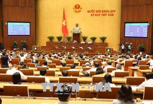 Quốc hội biểu quyết thông qua Luật tố cáo (sửa đổi) với tỷ lệ tán thành 96,10%. Ảnh: Dương Giang - TTXVN