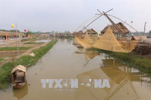 Tái hiện làng quê tại Khu du lịch văn hóa Phương Nam trong khuôn khổ diễn tra Tuần lễ du lịch Đồng Tháp năm 2018. Ảnh: Nguyễn Văn Trí - TTXVN