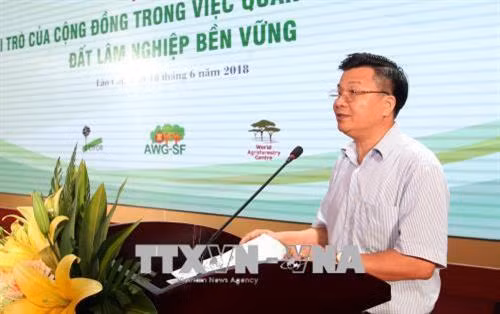 Ông Tô Mạnh Tiến, Phó giám đốc Sở Nông nghiệp và Phát triển nông thôn tỉnh Lào Cai phát biểu khai mạc hội thảo. Ảnh: Quốc Khánh - TTXVN