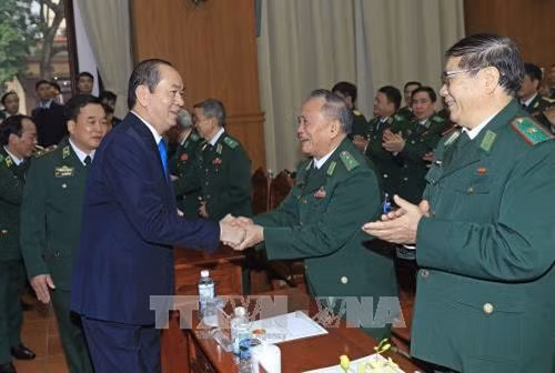 Chủ tịch nước Trần Đại Quang với các đại biểu dự lễ kỷ niệm. Ảnh: Nhan Sáng-TTXVN