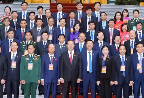 Chủ tịch nước Trần Đại Quang với các đại biểu tại buổi gặp mặt. Ảnh: Nhan Sáng-TTXVN