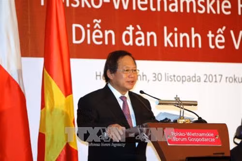 Bộ trưởng Bộ Thông tin và Truyền thông Trương Minh Tuấn phát biểu tại diễn đàn. Ảnh: Thanh Vũ-TTXVN