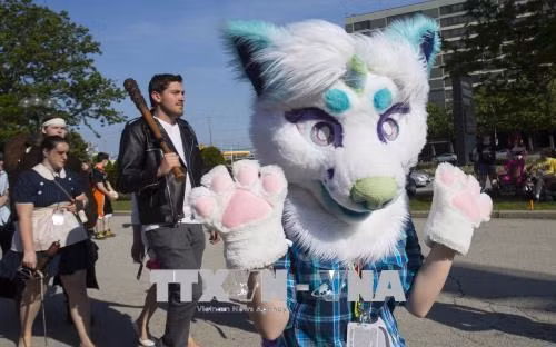 Các bạn trẻ hóa trang thành các nhân vật yêu thích tại lễ hội hóa trang Anime 2018 ở Toronto. THX/ TTXVN
