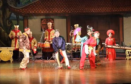 Biểu diễn trích đoạn hoạt cảnh ''Ngày hội quê tôi'' tại chương trình Tuồng "Hồn Việt". Ảnh: Trần Lê Lâm - TTXVN