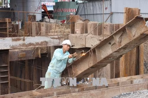 Gấp rút thi công nhánh hầm N2, dự án hầm chui An Sương. Ảnh: Tiến Lực - TTXVN