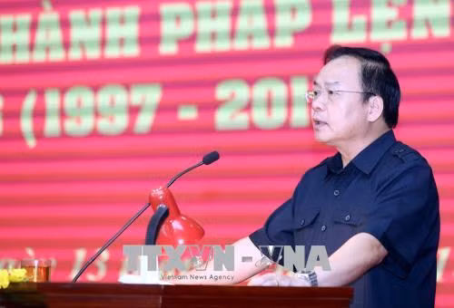 Chủ tịch UBND tỉnh Điên Biên Mùa A Sơn phát biểu tại Hội nghị. Ảnh: Phan Tuấn Anh - TTXVN