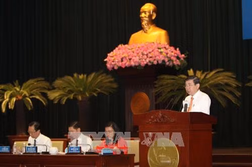 Chủ tịch UBND Thành phố Hồ Chí Minh Nguyễn Thành Phong phát biểu khai mạc Hội nghị. Ảnh: Thanh Vũ-TTXVN