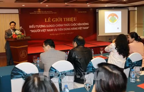 Công bố Logo Cuộc vận động “Người Việt Nam ưu tiên dùng hàng Việt Nam”. Ảnh: Trần Việt - TTXVN