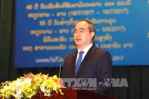 Đồng chí Nguyễn Thiện Nhân, Ủy viên Bộ Chính trị, Bí thư Thành ủy TP. Hồ Chí Minh, đọc diễn văn tại lễ kỷ niệm. Ảnh: Thanh Vũ-TTXVN