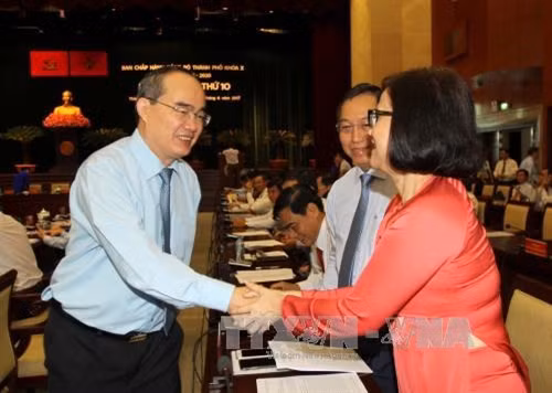 Bí thư Thành ủy Thành ủy Hồ Chí Minh Nguyễn Thiện Nhân với các đại biểu dự hội nghị. Ảnh: Thanh Vũ-TTXVN