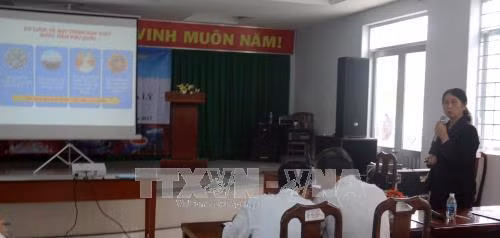 Trình bày tham luận tại hội thảo. Ảnh: Lê Huy Hải - TTXVN