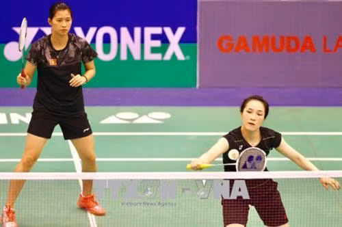 Cặp đôi VĐV Vũ Thị Trang (phải) và Vũ Thị Sen của Việt Nam. Ảnh: Quang Nhựt - TTXVN
