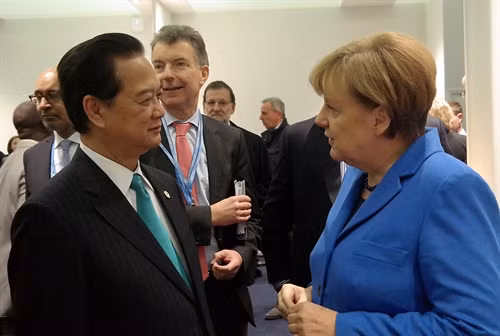 Thủ tướng Chính phủ Nguyễn Tấn Dũng gặp Thủ tướng Đức Angela Merkel. Ảnh: TTXVN phát