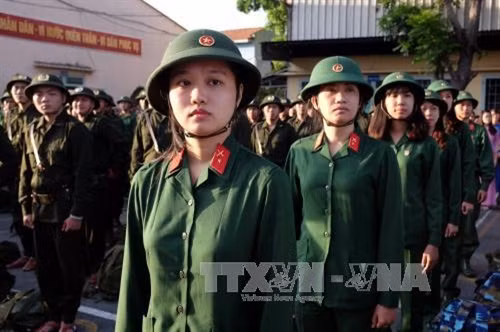 Thanh niên thành phố lên đường nhập ngũ tại điểm giao quân Quận 9, Thành phố Hồ Chí Minh. Ảnh: Thế Anh - TTXVN