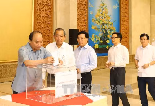 Văn phòng Chính phủ quyên góp ủng hộ đồng bào bị thiệt hại do bão số 10 ảnh 1