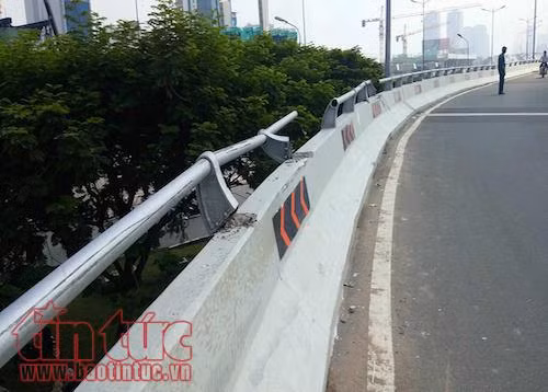 ‘Xế hộp’ lộn nhào nhiều vòng sau khi húc vào lan can cầu ảnh 2