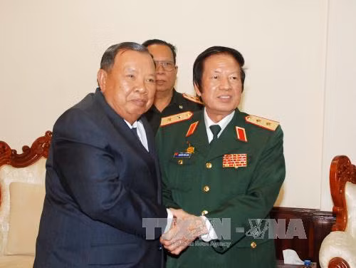 Lãnh đạo Lào tiếp đoàn đại biểu cựu chuyên gia và quân tình nguyện Việt Nam ảnh 2
