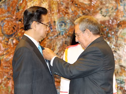 Thủ tướng Nguyễn Tấn Dũng hội đàm với Chủ tịch Cuba Raul Castro ảnh 2