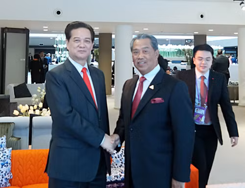 Thủ tướng Nguyễn Tấn Dũng tiếp Thủ tướng Singapore và Phó Thủ tướng Malaysia ảnh 2