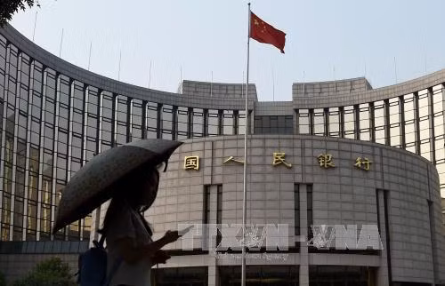 Trung Quốc giảm tỷ lệ dự trữ bắt buộc và hạ lãi suất ảnh 1