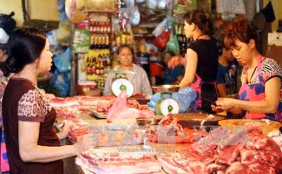 Mưa bão, giá rau xanh và thịt tăng nhẹ ảnh 1