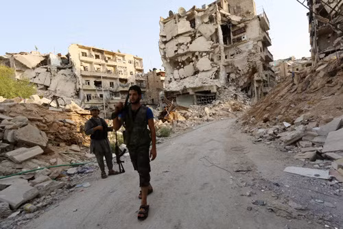 LHQ cáo buộc cả Chính phủ Syria và IS phạm tội ác chiến tranh ảnh 1