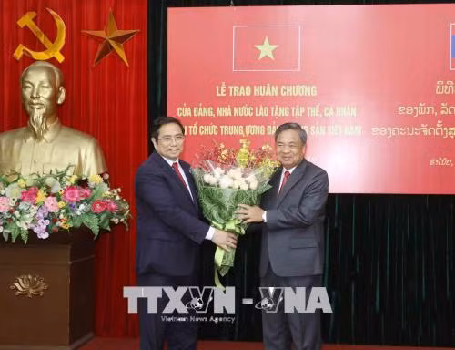 Tổng bí thư tiếp đoàn đại biểu Ban Tổ chức Trung ương Đảng Nhân dân Cách mạng Lào ảnh 2