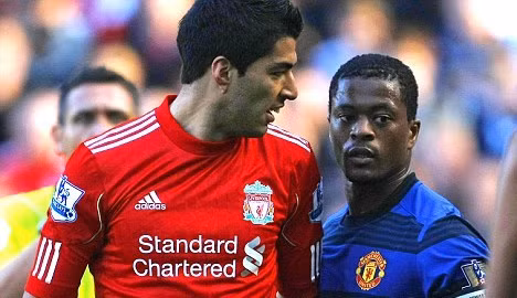 FA xác nhận Suarez có phân biệt chủng tộc với Evra ảnh 1