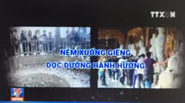 Xử phạt hành vi ném, thả tiền xuống giếng khu di tích
