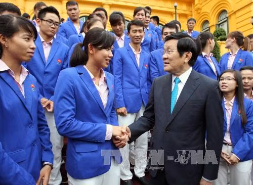 Chủ tịch nước gặp mặt đoàn thể thao Việt Nam dự SEA Games ảnh 1