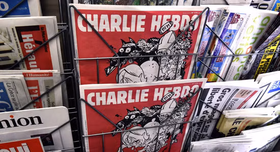 Điện Kremlin: Biếm họa A321 trên tạp chí Charlie Hebdo là sự báng bổ ảnh 1
