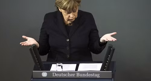 Truyền thông Đức bác tin về ảnh chụp của bà Merkel với kẻ khủng bố ảnh 1