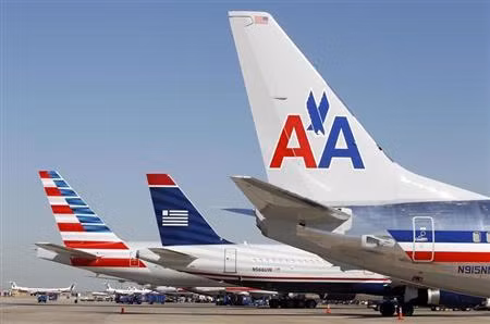 AMR và US Airways sáp nhập thành hãng hàng không lớn nhất thế giới ảnh 1