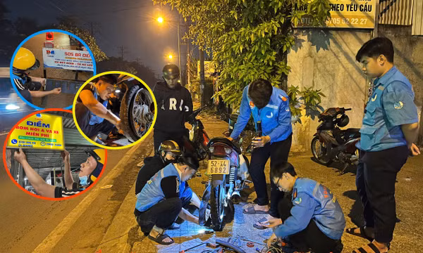 Đội SOS Bà Điểm xuyên đêm vá xe miễn phí cho người đi đường ở TP Hồ Chí Minh.