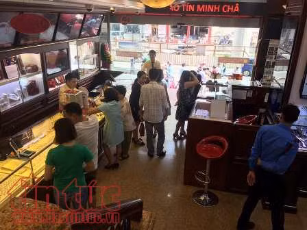 Giá vàng giảm dè dặt theo chiều thế giới ảnh 1