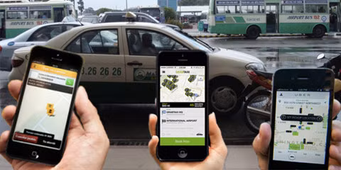 Tổng cục Thuế lên tiếng về chính sách thuế giữa taxi truyền thống với Uber và Grab ảnh 1
