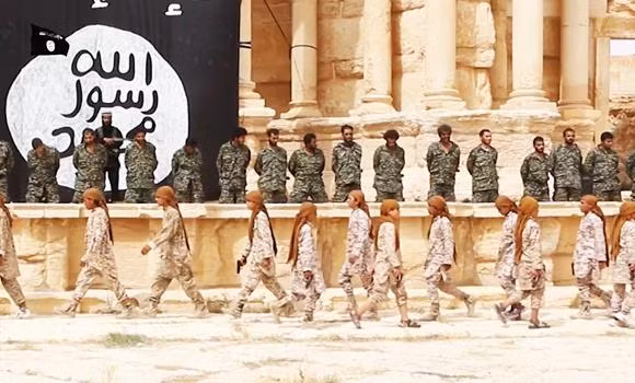 IS công bố video trẻ em hành quyết lính Syria ảnh 1