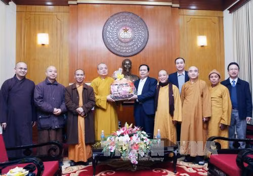 Chung tay mang Tết ấm no đến với người nghèo ảnh 1