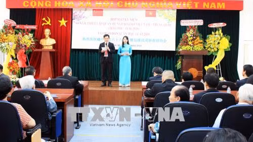 Họp mặt kỷ niệm 68 năm Ngày thiết lập quan hệ ngoại giao Việt Nam - Trung Quốc ảnh 1