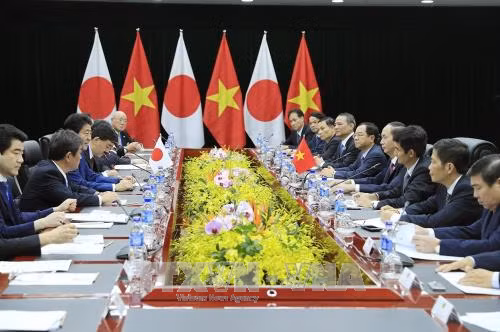 APEC 2017: Chủ tịch nước Trần Đại Quang tiếp Thủ tướng Nhật Bản ảnh 2