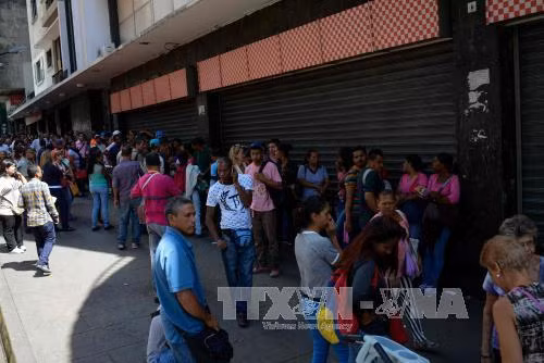Standard & Poor's tuyên bố Venezuela 'vỡ nợ một phần' ảnh 1