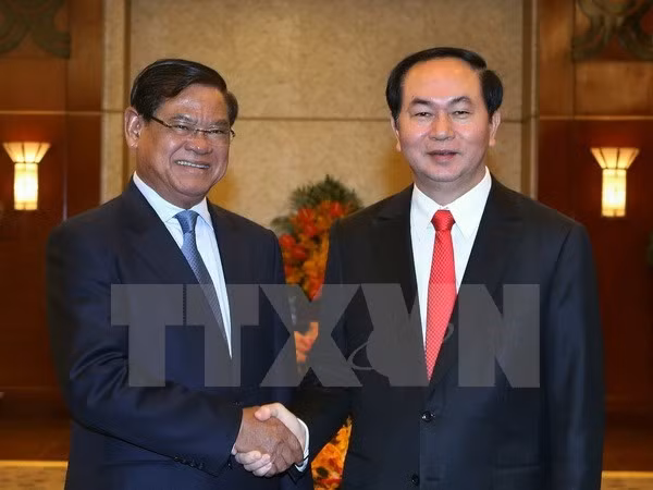 Chủ tịch nước và Phu nhân đi thăm cấp Nhà nước CHDCND Lào ảnh 2