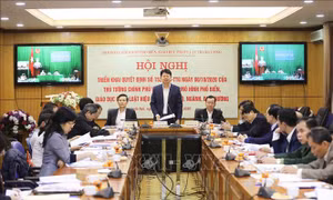 Quang cảnh hội nghị tại điểm cầu Bộ Tư pháp (Hà Nội). Thứ trưởng Bộ Tư pháp Nguyễn Thanh Tịnh chủ trì hội nghị. Ảnh: Thanh Tùng - TTXVN.