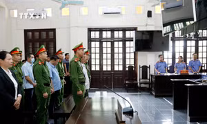 Các bị cáo bị tuyên án trong phiên tòa xét xử sơ thẩm. Ảnh: Quốc Khánh - TTXVN